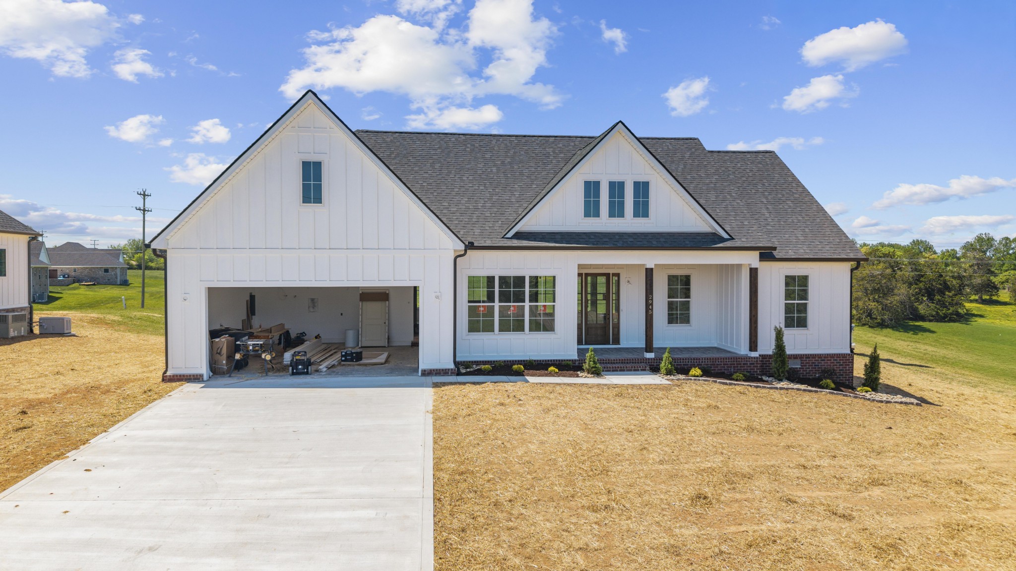 2945 Cane Creek Road Cookeville, TN 38506 - Photo 1 of 15 a front view of a house with yard and seating space