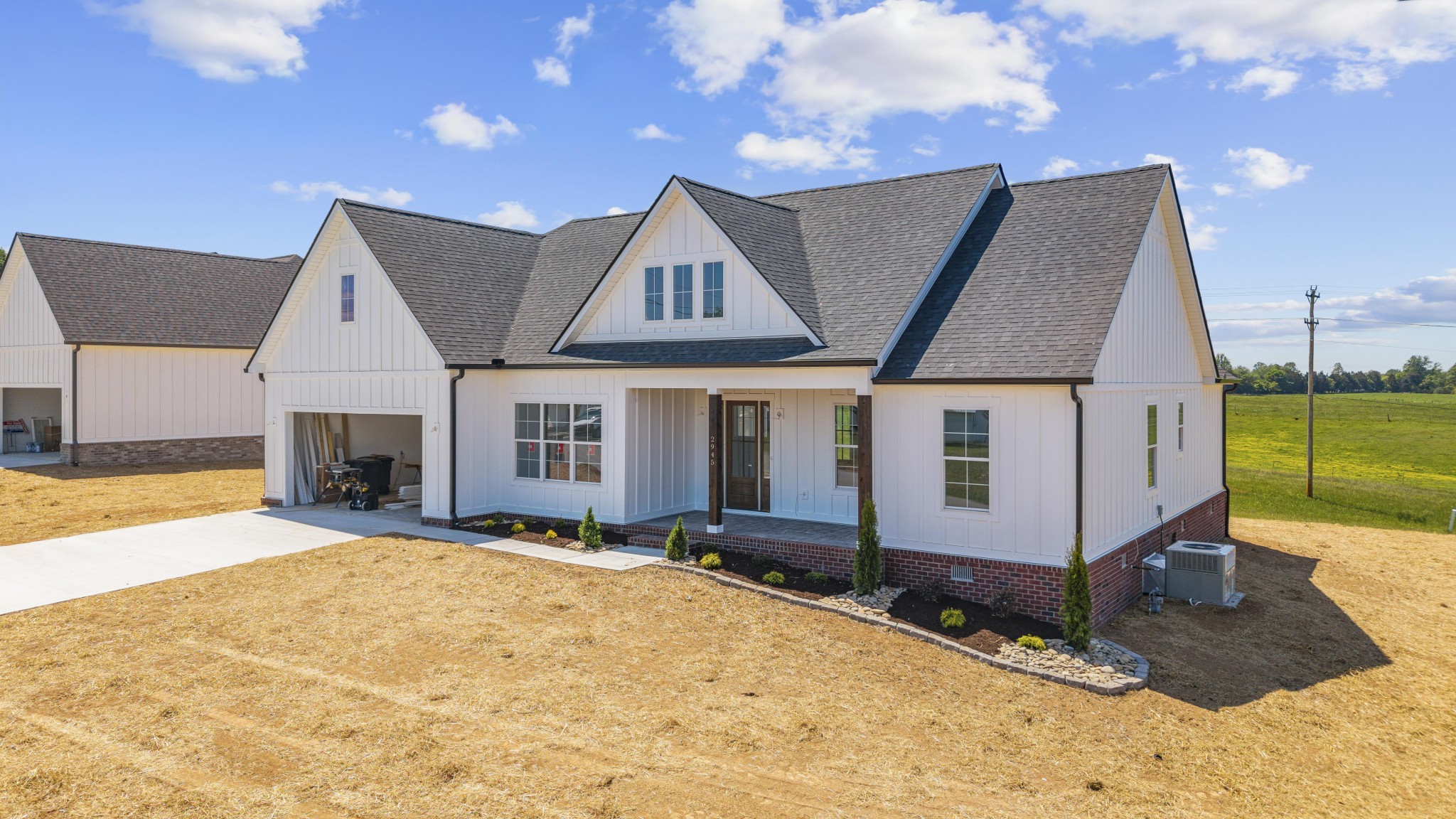 2945 Cane Creek Road Cookeville, TN 38506 - Photo 3 of 15 a view of a house with a yard and sitting area