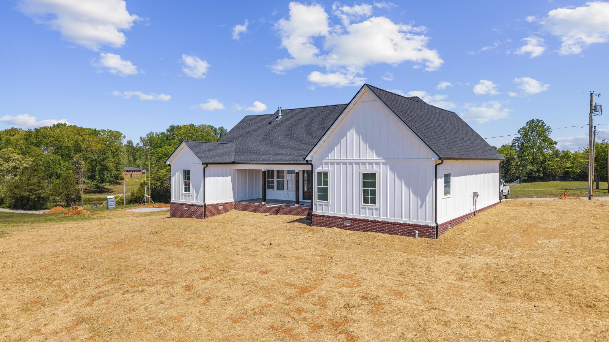 2945 Cane Creek Road Cookeville, TN 38506 - Photo 4 of 15 a front view of house with yard and trees in the background