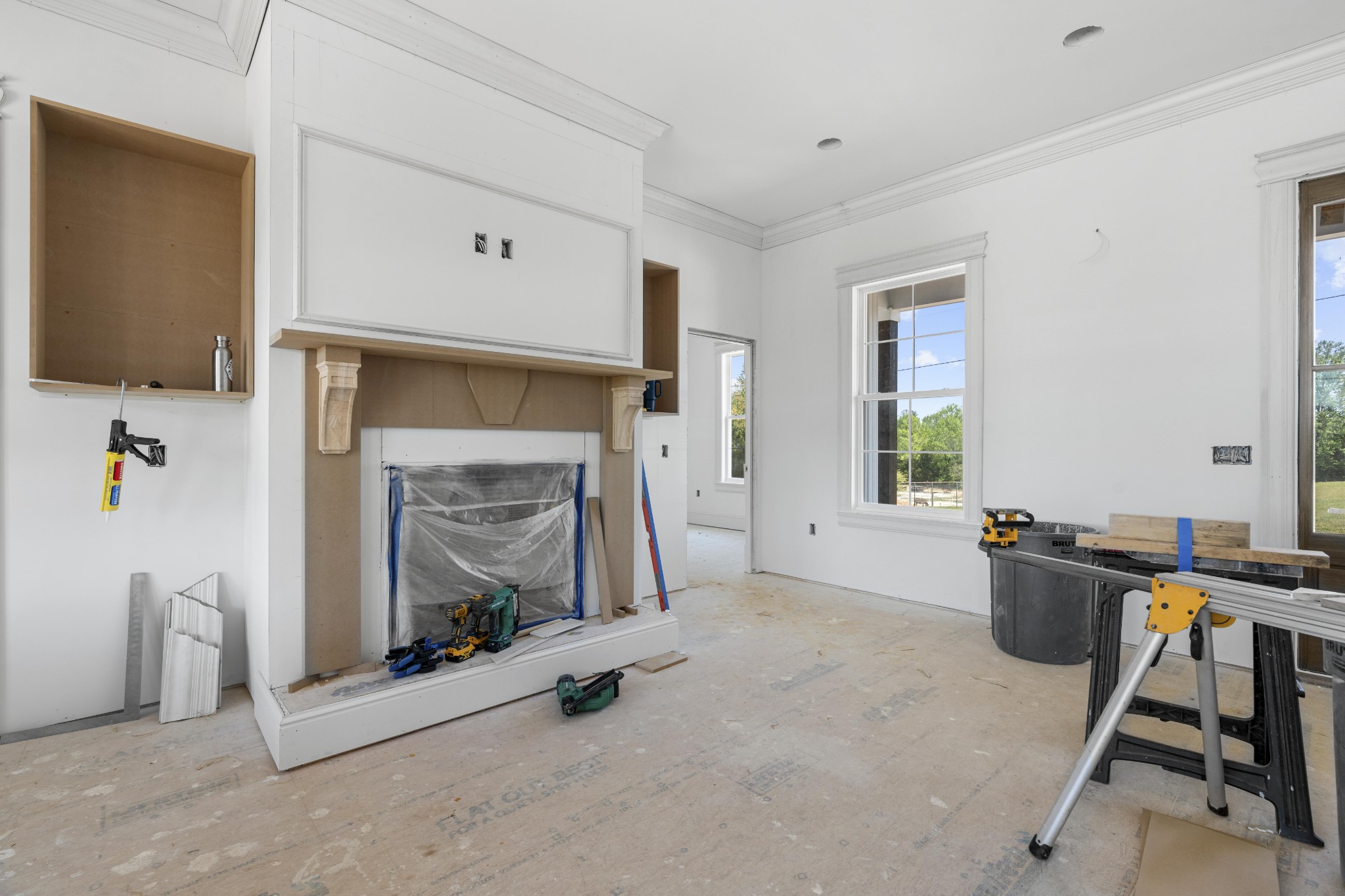 2945 Cane Creek Road Cookeville, TN 38506 - Photo 8 of 15 a living room with furniture a flat screen tv and a fireplace