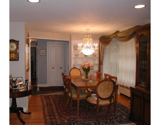 65 Donna Road Needham, MA 02494 - Photo 5 of 8 a view of a dining room with furniture and chandelier