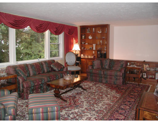 65 Donna Road Needham, MA 02494 - Photo 6 of 8 a living room with furniture and a large window