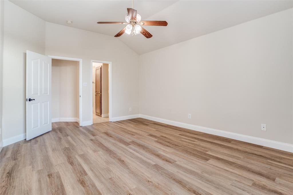 2129 Clubside Drive Corinth, TX 76210 - Photo 18 of 39 a view of empty room with wooden floor