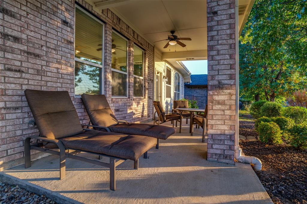 2129 Clubside Drive Corinth, TX 76210 - Photo 24 of 39 a view of a lounge chairs in the patio