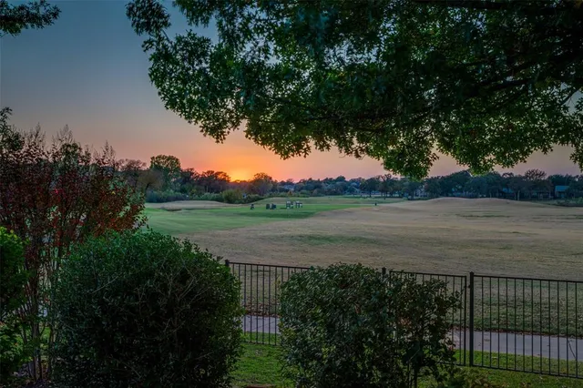 a view of backyard with green space