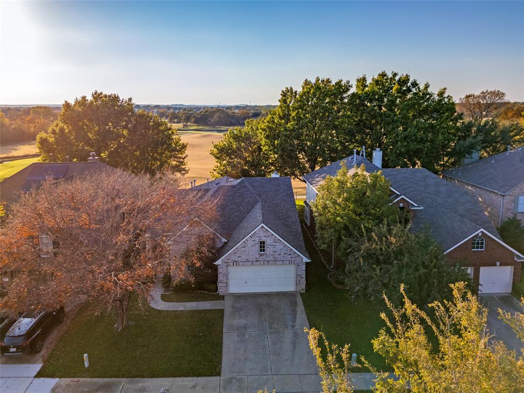 2129 Clubside Drive Corinth, TX 76210 - Photo 31 of 39 an aerial view of a house with a garden