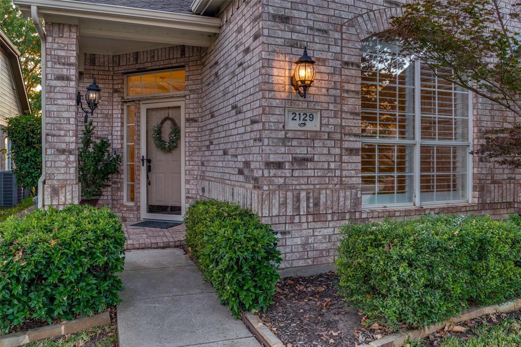 2129 Clubside Drive Corinth, TX 76210 - Photo 4 of 39 a view of a pathway both side of house