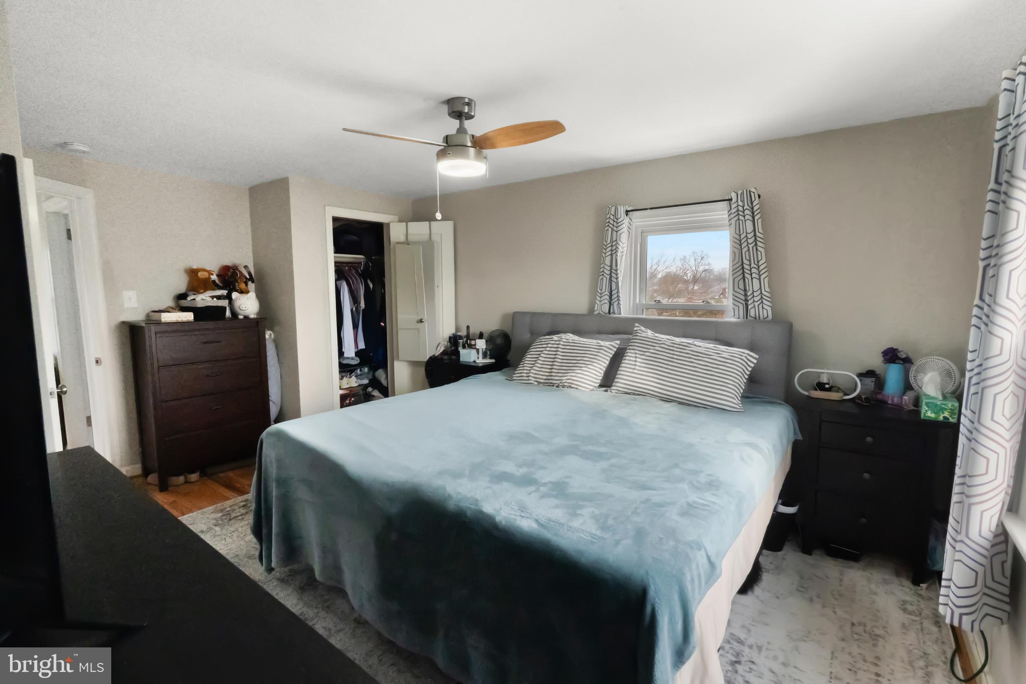 17 Upland Road Brookhaven, PA 19015 - Photo 18 of 25 a bed room with a bed and a television