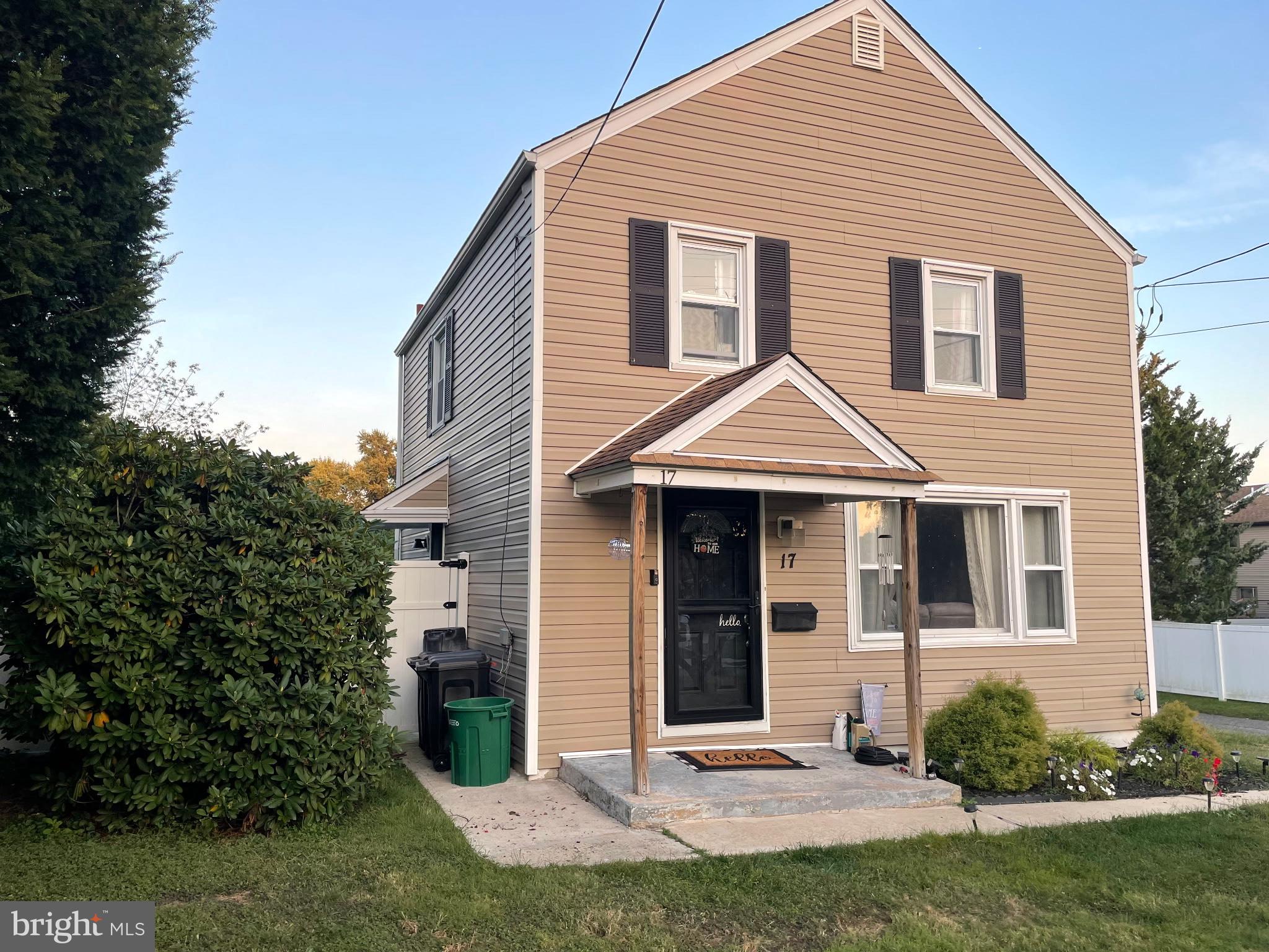 17 Upland Road Brookhaven, PA 19015 - Photo 24 of 25 a front view of a house with a yard and plants
