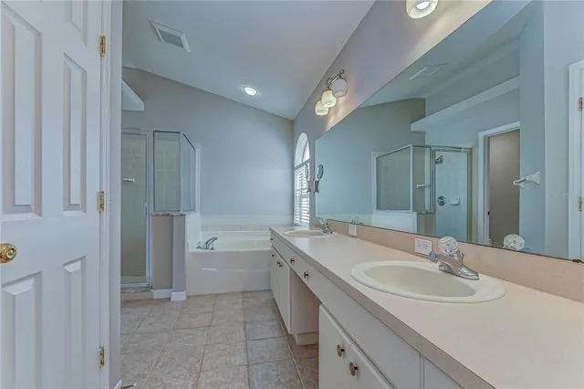 an empty room that has a bathroom in it