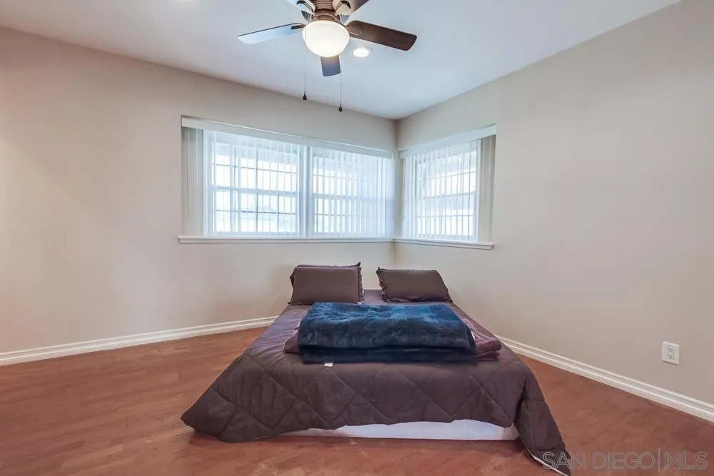 4441 Appleton Street San Diego, CA 92117 - Photo 17 of 29 a living room with furniture and a window