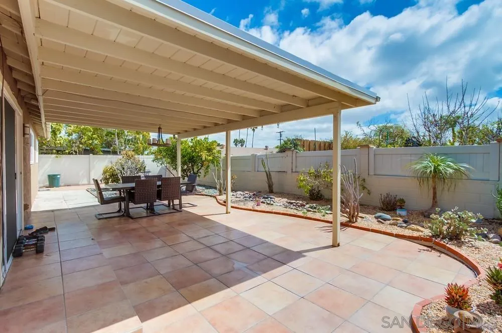 4441 Appleton Street San Diego, CA 92117 - Photo 23 of 29 a view of a backyard with sitting area and furniture