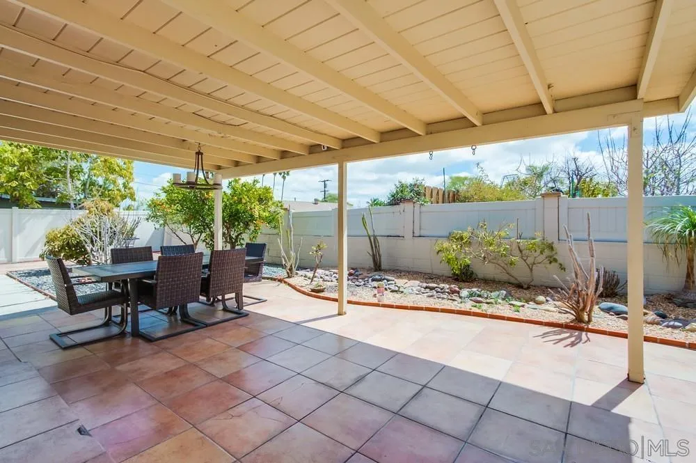 4441 Appleton Street San Diego, CA 92117 - Photo 24 of 29 a outdoor space with the couches and dining table chair with garden view
