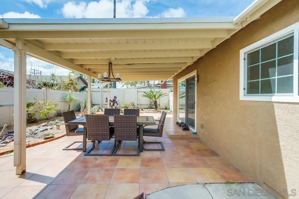 4441 Appleton Street San Diego, CA 92117 - Photo 25 of 29 a view of a dining room with furniture window and outside view