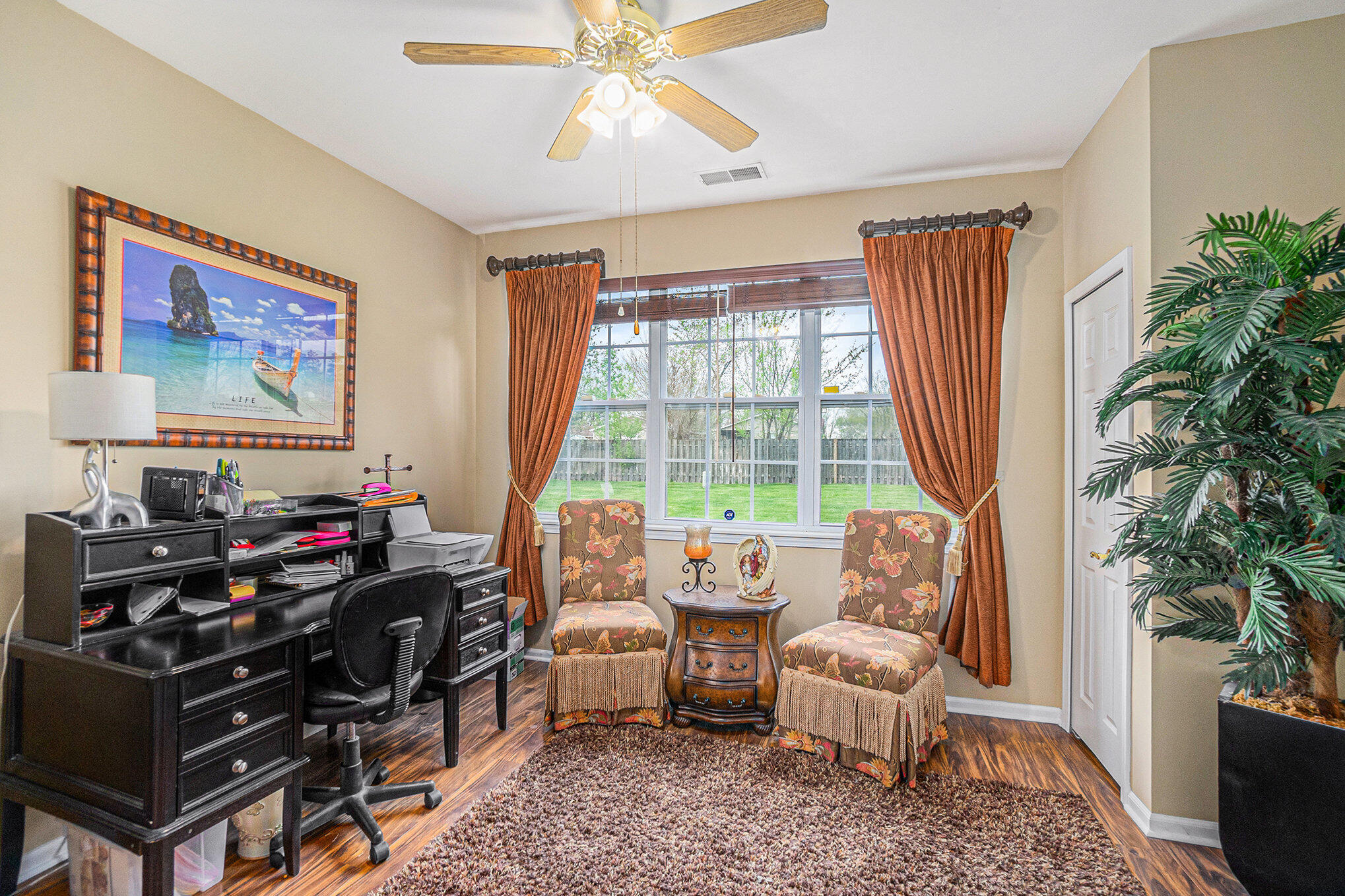 12190 80th Place Dyer, IN 46311 - Photo 11 of 16 a living room with furniture and a flat screen tv