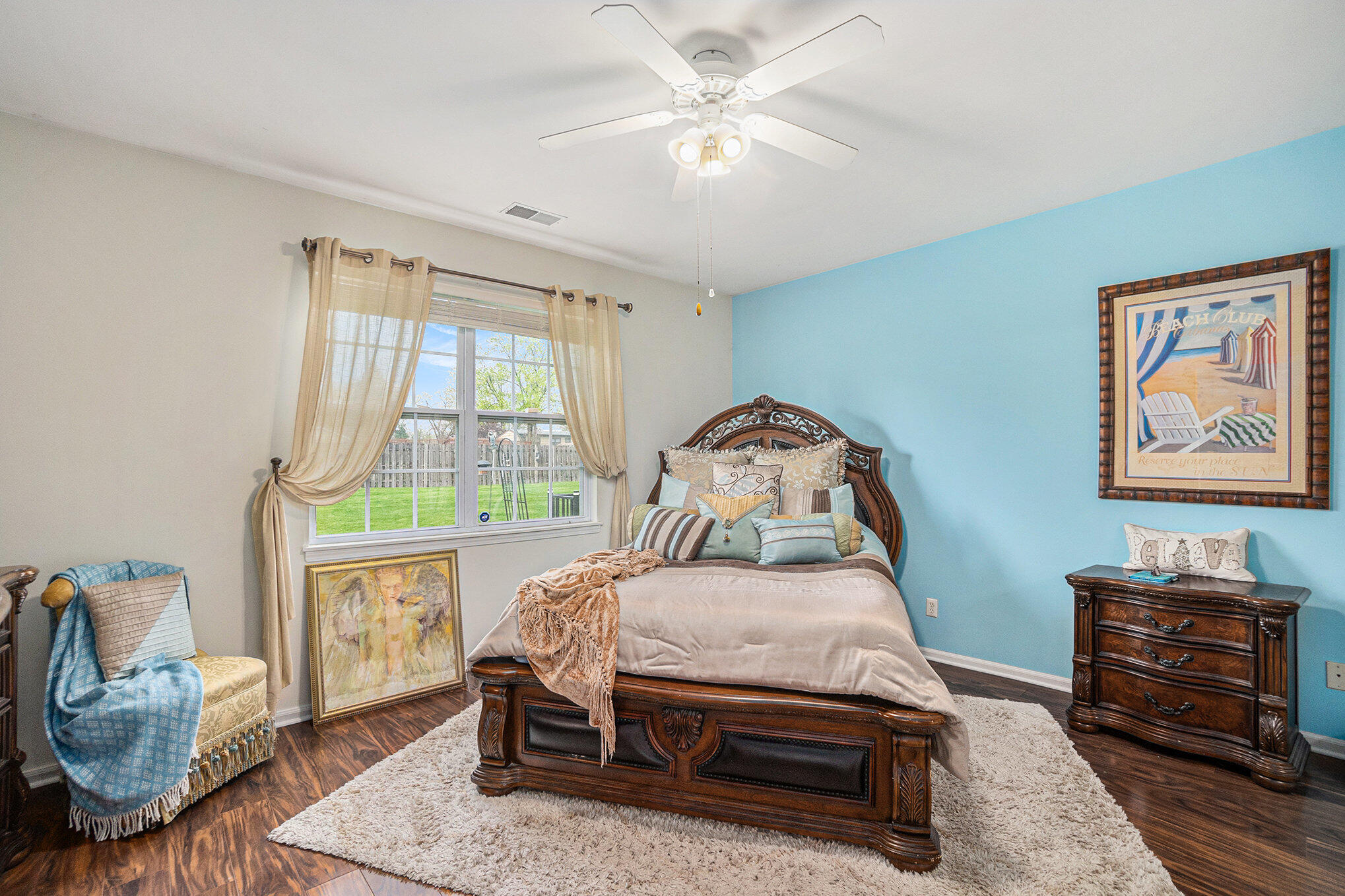 12190 80th Place Dyer, IN 46311 - Photo 12 of 16 a bedroom with furniture and a window