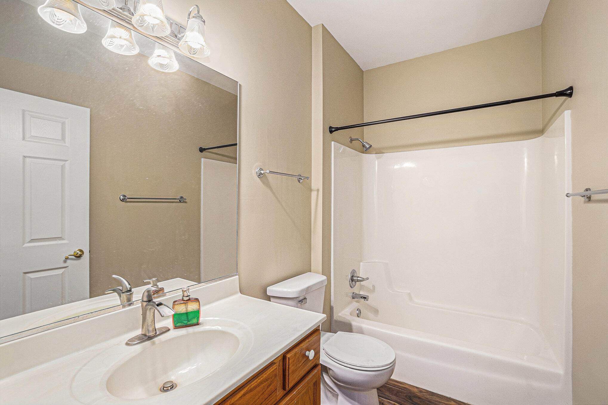 12190 80th Place Dyer, IN 46311 - Photo 15 of 16 a bathroom with a sink a toilet and shower