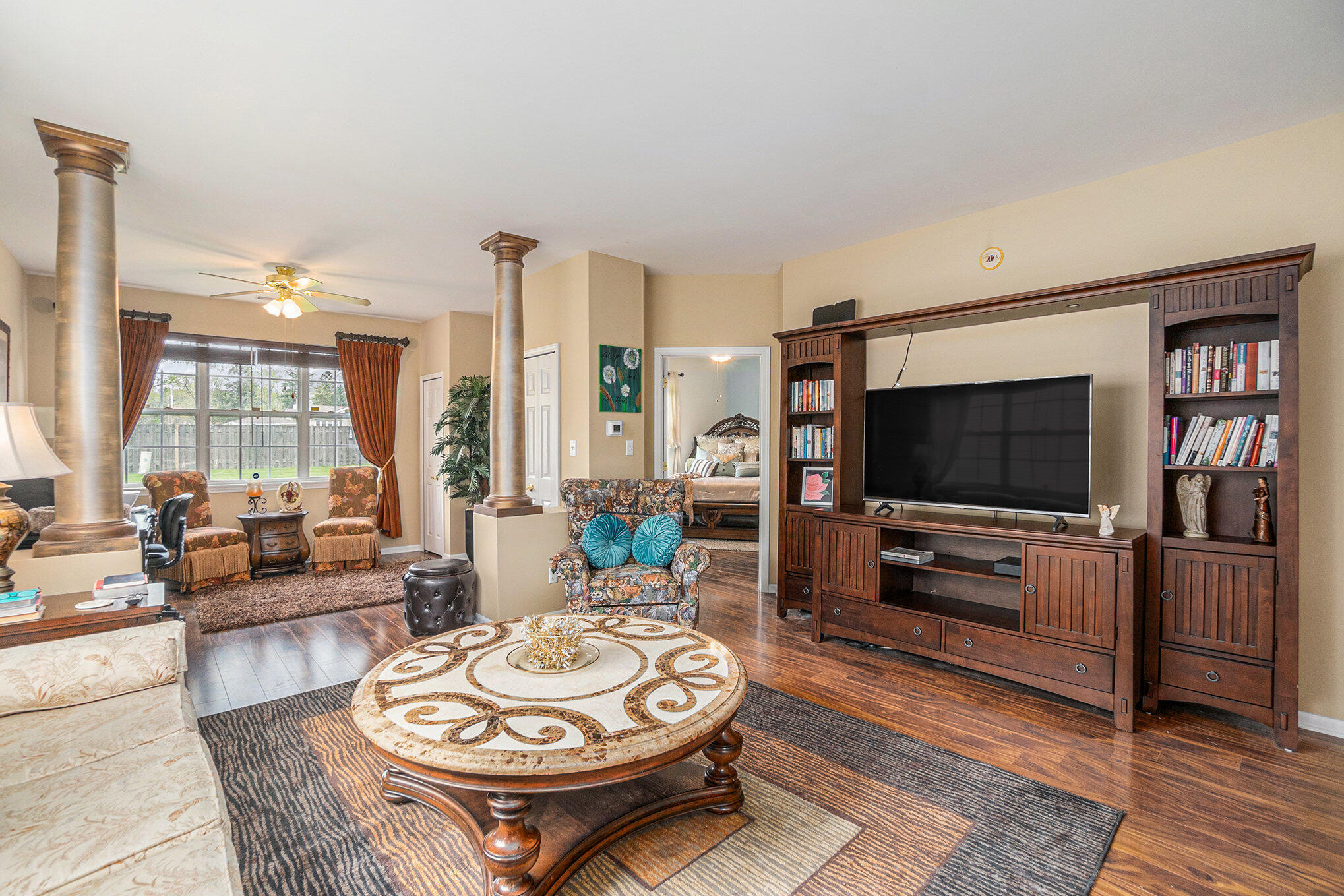12190 80th Place Dyer, IN 46311 - Photo 10 of 16 a living room with furniture and a flat screen tv