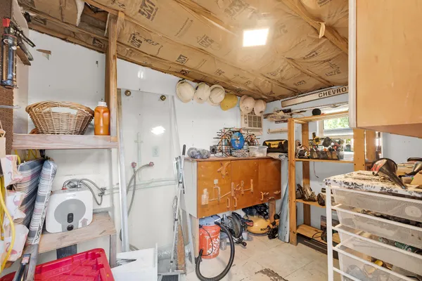 an outdoor space with patio area and furniture