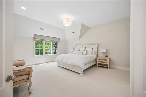 a view of a livingroom with furniture and a workspace