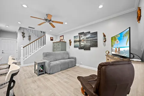 a large kitchen with a table and chairs