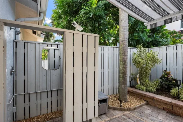 a backyard of a house with seating space