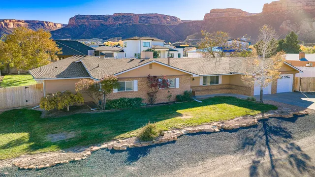 a view of house and outdoor space with swimming pool