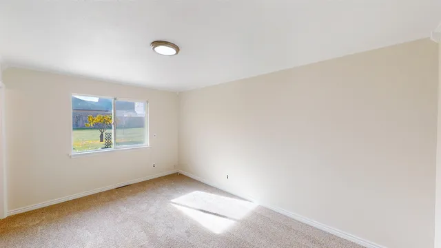 an empty room with a window