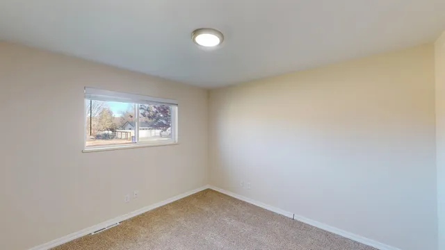 an empty room with a window