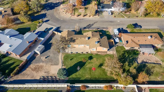 an aerial view of a house with a ocean view