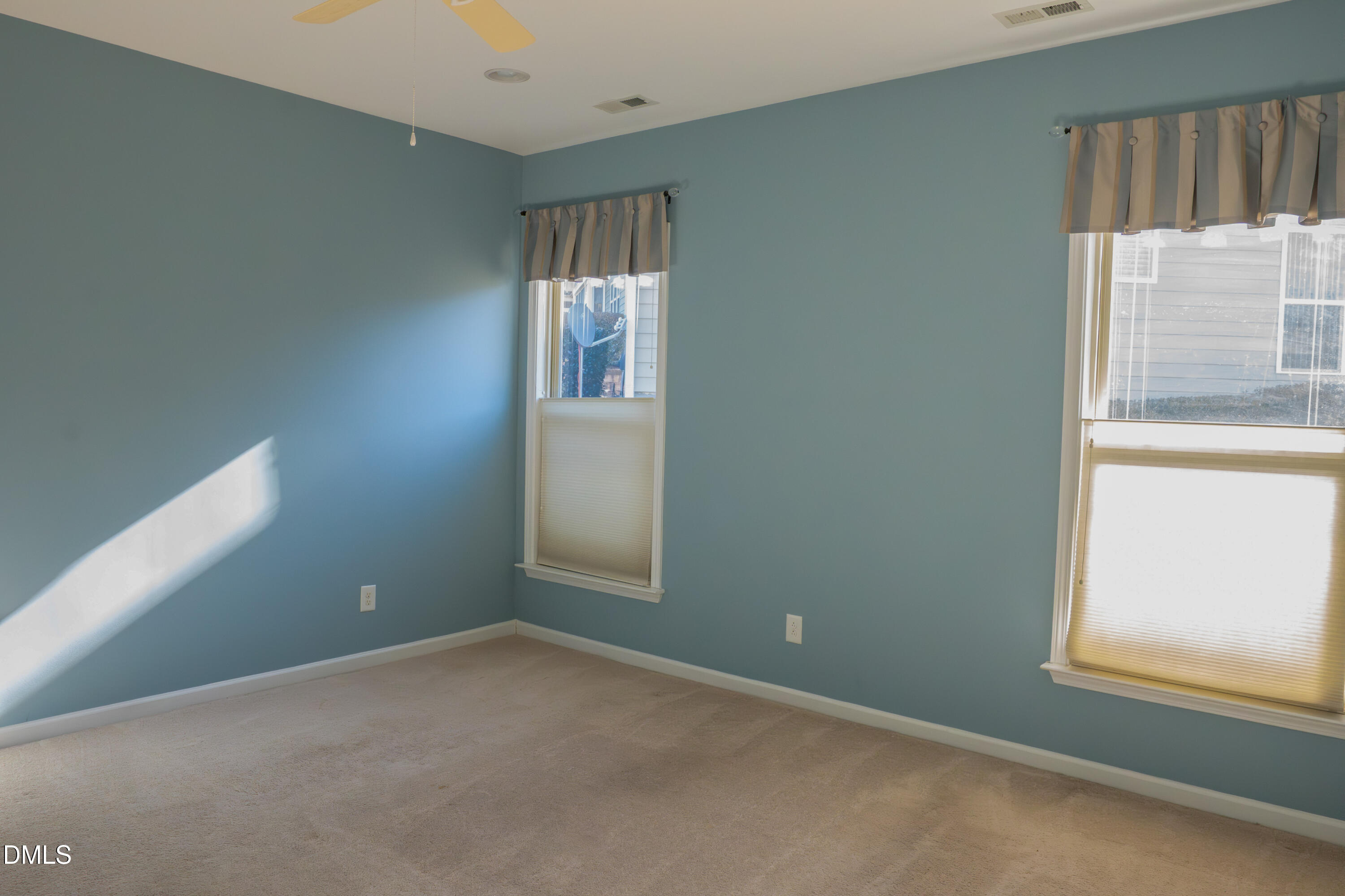 314 Rosedale Creek Drive Durham, NC 27703 - Photo 16 of 33 an empty room with windows