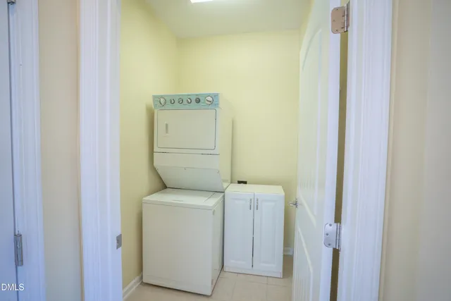 a view of bathroom with a washer and dryer