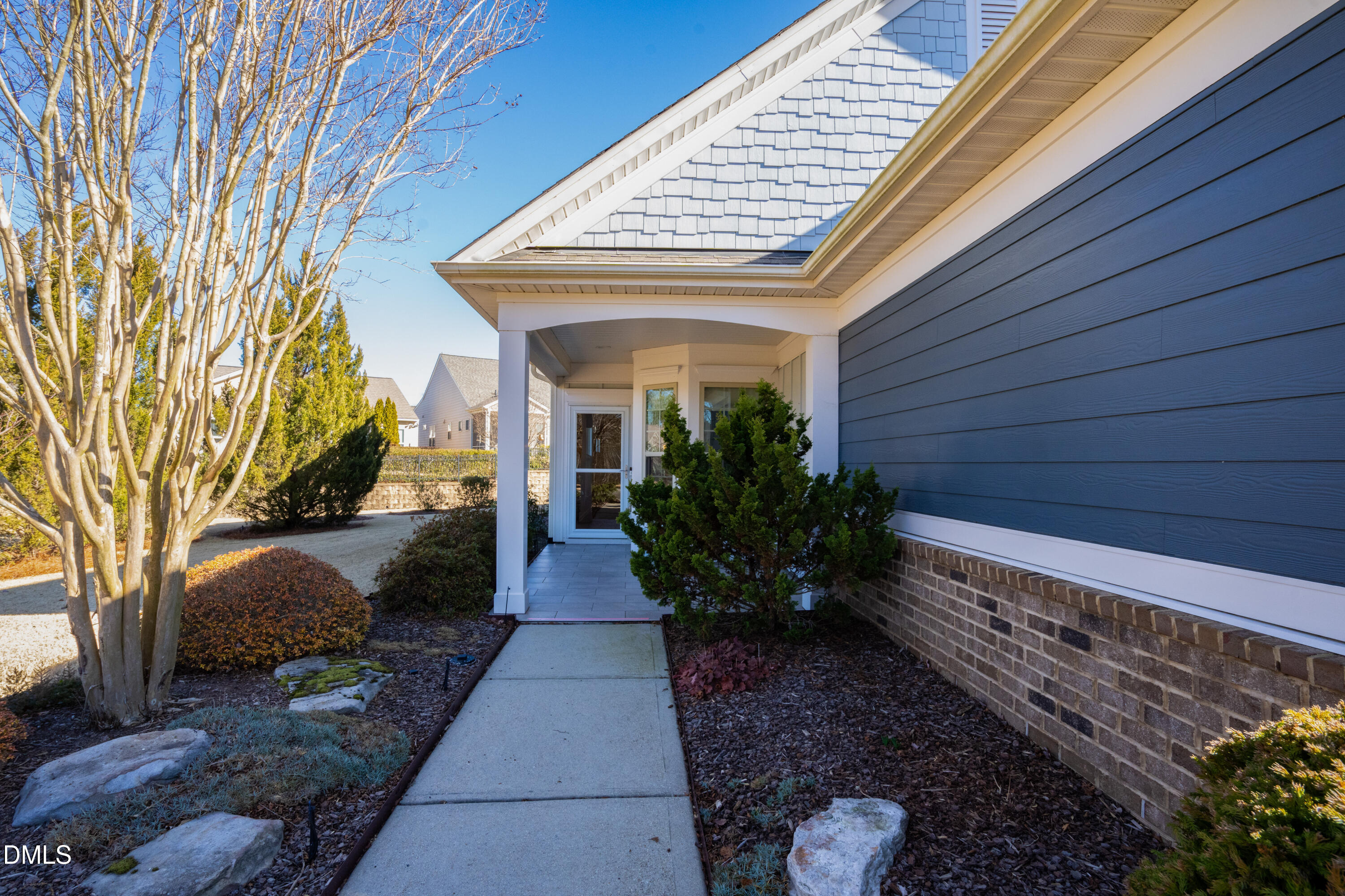 314 Rosedale Creek Drive Durham, NC 27703 - Photo 4 of 33 a view of a pathway with a house