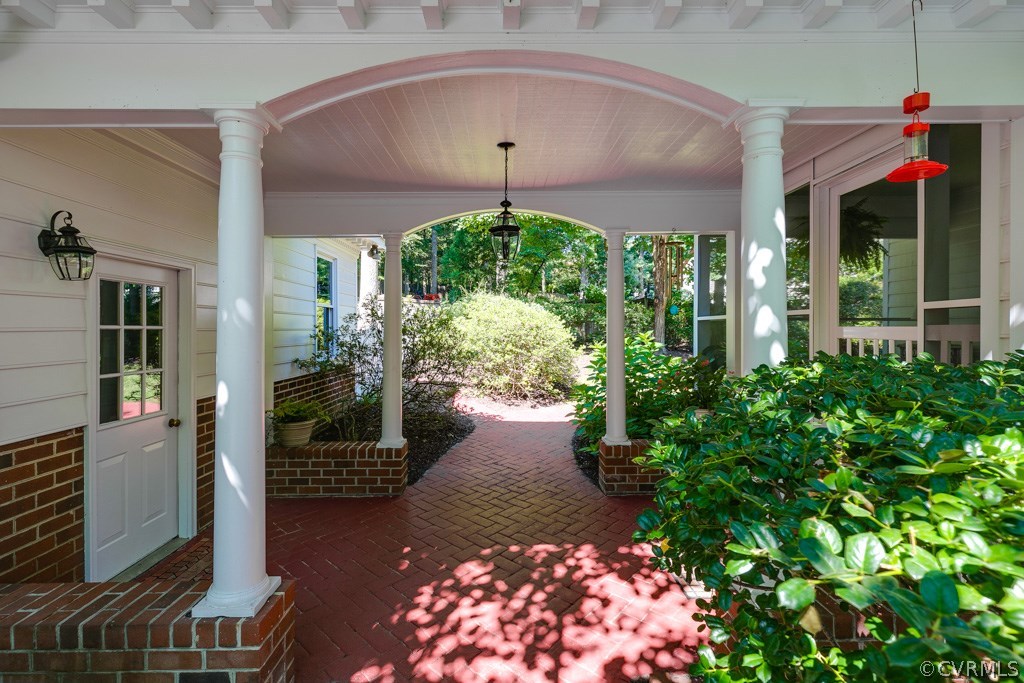 304 Hill Point Road Richmond, VA 23238 - Photo 48 of 50 Arched covered breezeway leading from Screened Por