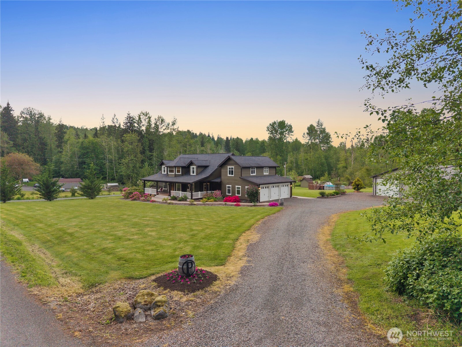 14905 218th Street Southeast Monroe, WA 98272 - Photo 11 of 40 a view of a town with barn in the background