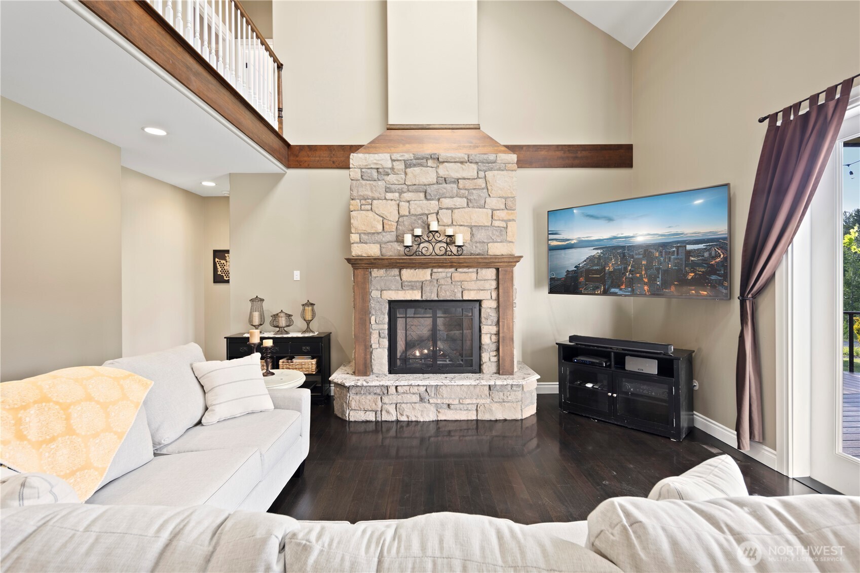 14905 218th Street Southeast Monroe, WA 98272 - Photo 15 of 40 a living room with furniture large window and a fireplace