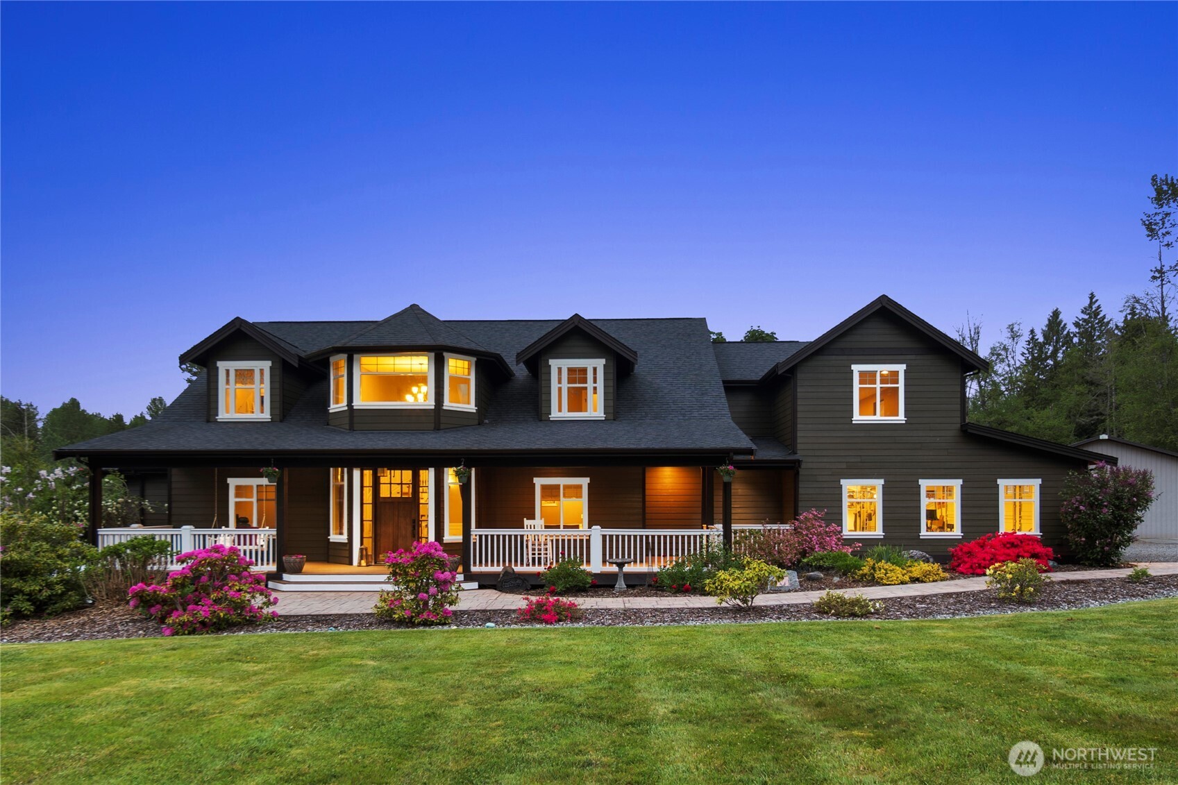 14905 218th Street Southeast Monroe, WA 98272 - Photo 2 of 40 a front view of a house with a yard