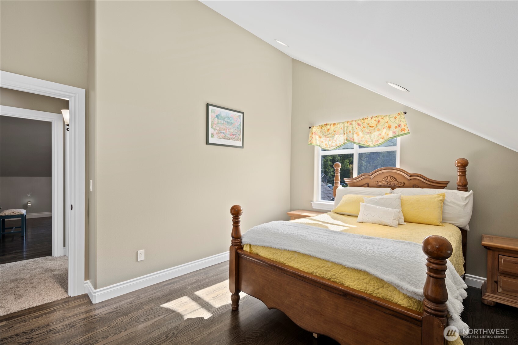 14905 218th Street Southeast Monroe, WA 98272 - Photo 31 of 40 a bedroom with a bed and wooden floor