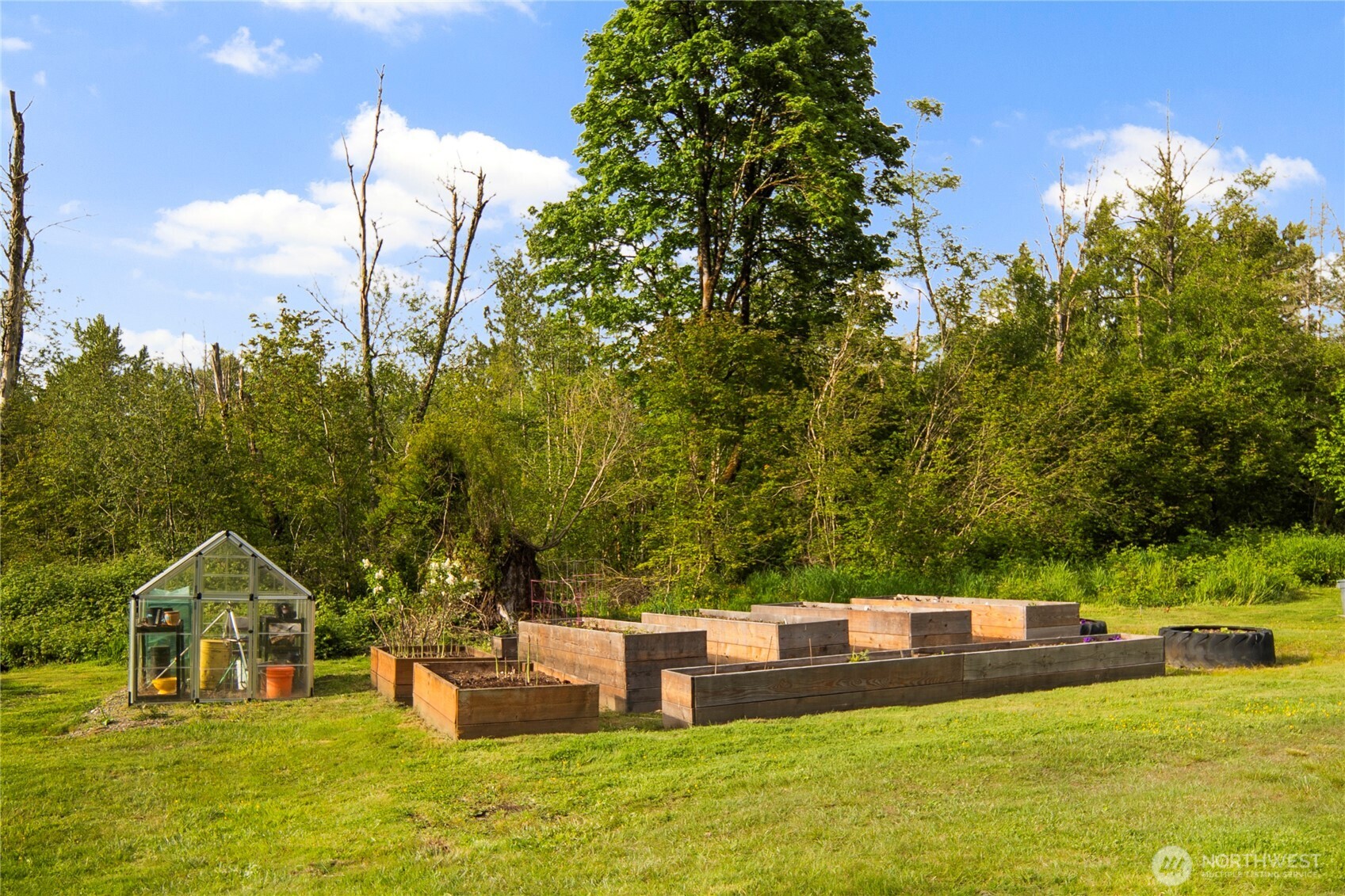 14905 218th Street Southeast Monroe, WA 98272 - Photo 38 of 40 a view of a swimming pool with a yard