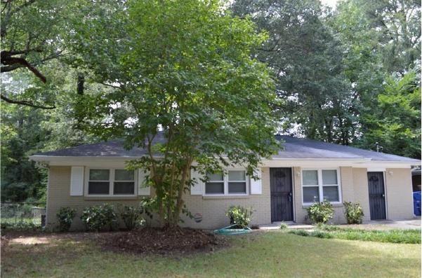 2537 Barge Road Southwest Atlanta, GA 30331 - Photo 1 of 1 front view of a house with a yard