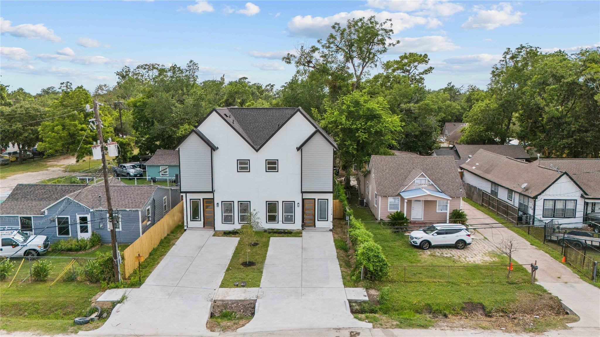 7805 Farnsworth Street, Unit B Houston, TX 77022 - Photo 13 of 26 a aerial view of a house with swimming pool in front of it
