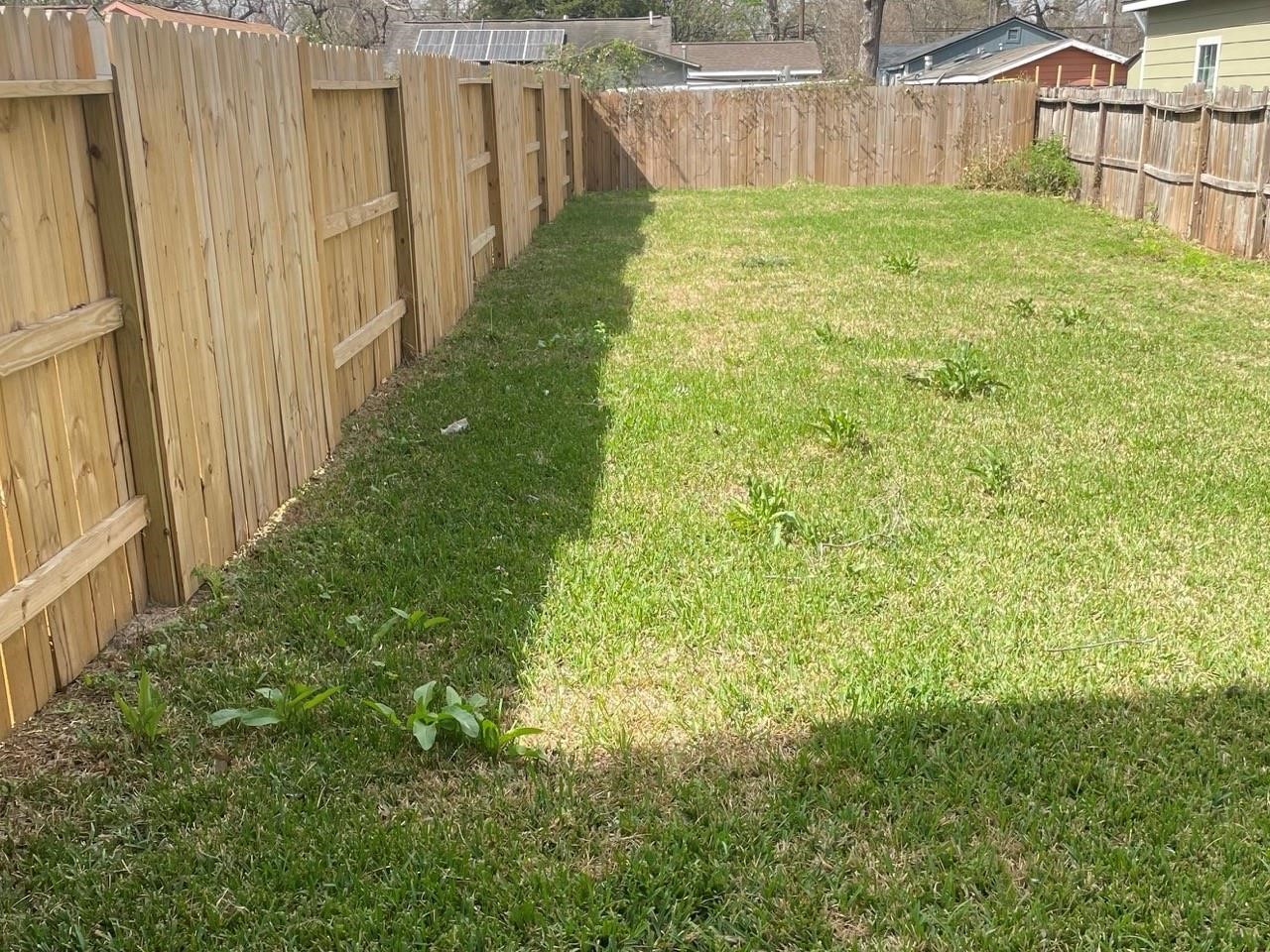 7805 Farnsworth Street, Unit B Houston, TX 77022 - Photo 24 of 26 a view of a backyard with pathway