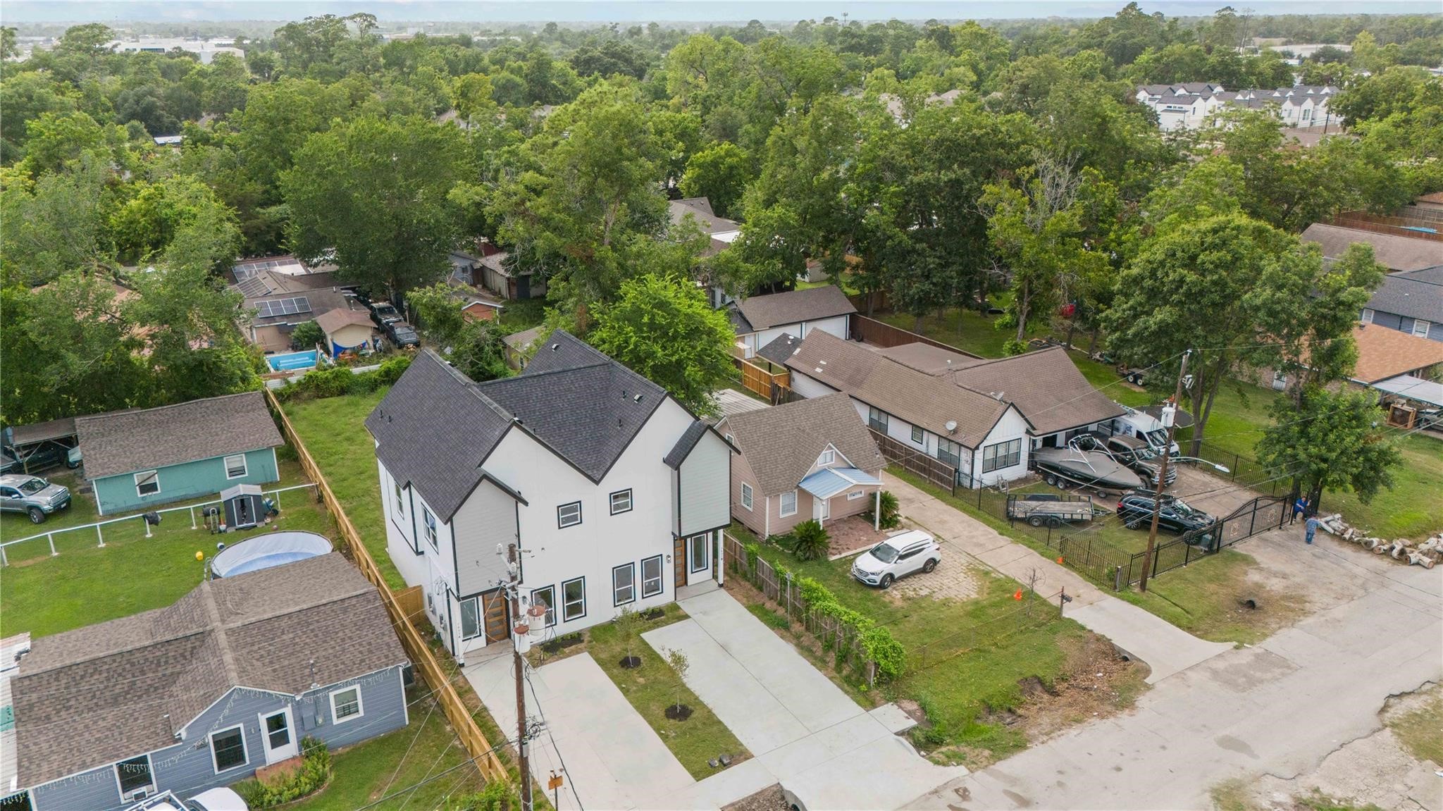 7805 Farnsworth Street, Unit B Houston, TX 77022 - Photo 26 of 26 an aerial view of a house with a garden
