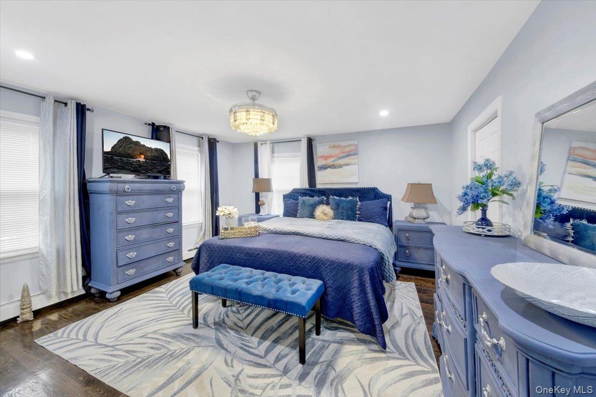 75 West Kingsbridge Road Mount Vernon, NY 10550 - Photo 21 of 37 a bedroom with a bed and a dresser