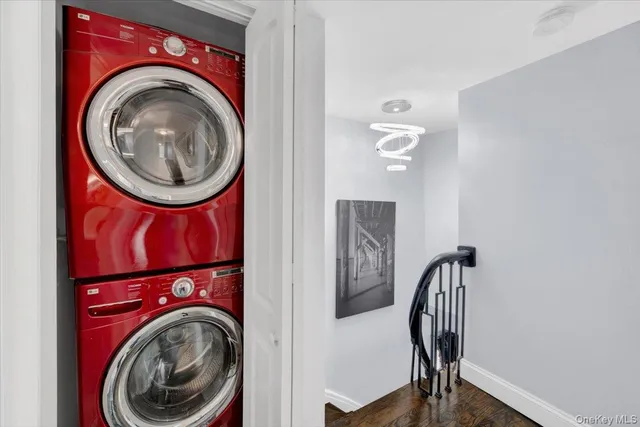 a view of a hallway with washer and dryer