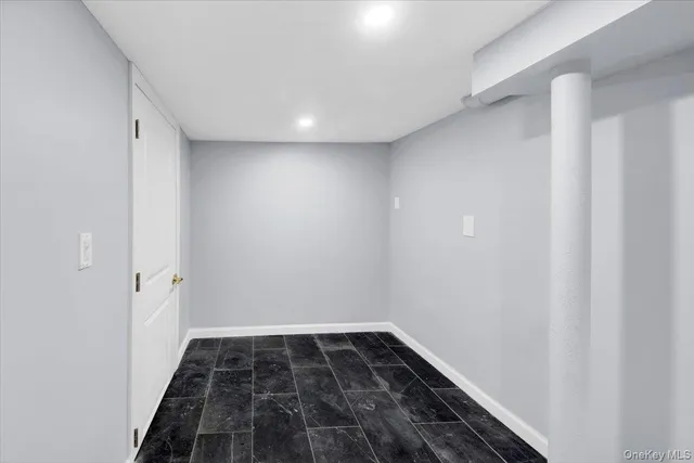 a view of a golf course with a house