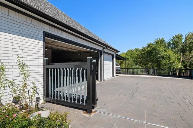 a view of a porch with a small yard