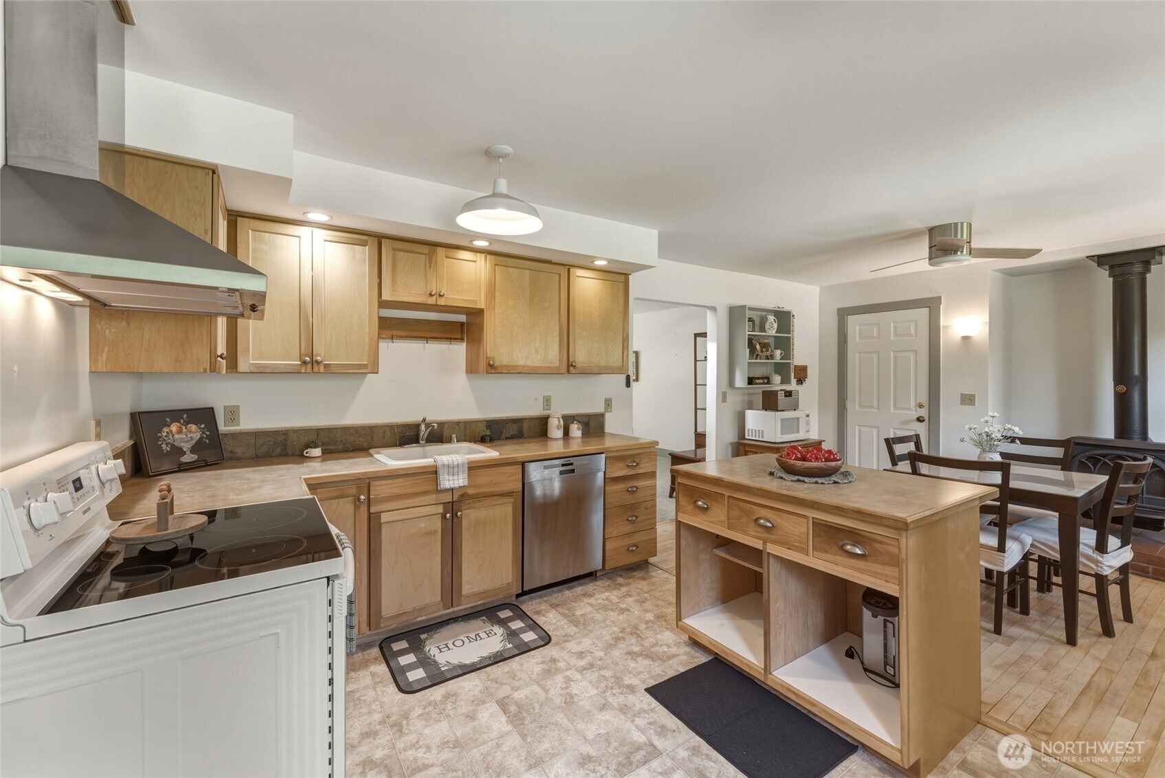 5834 Russell Creek Road Walla Walla, WA 99362 - Photo 15 of 38 a kitchen that has a stove and a sink
