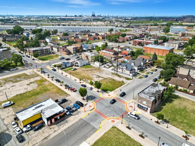 an aerial view of residential houses with outdoor space