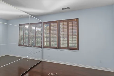 a view of a livingroom with furniture and wooden floor